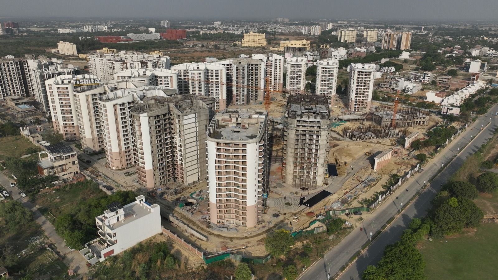 Actual aerial view of the Rishita Developers towers under construction at Sushant Golf City, Lucknow
