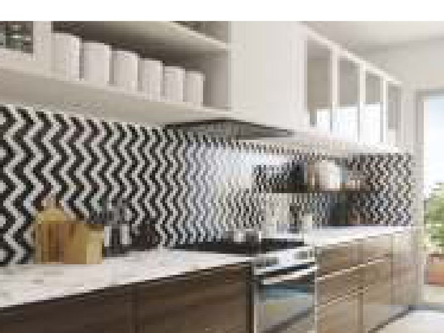 A modern kitchen at Rishita Mulberry Heights
