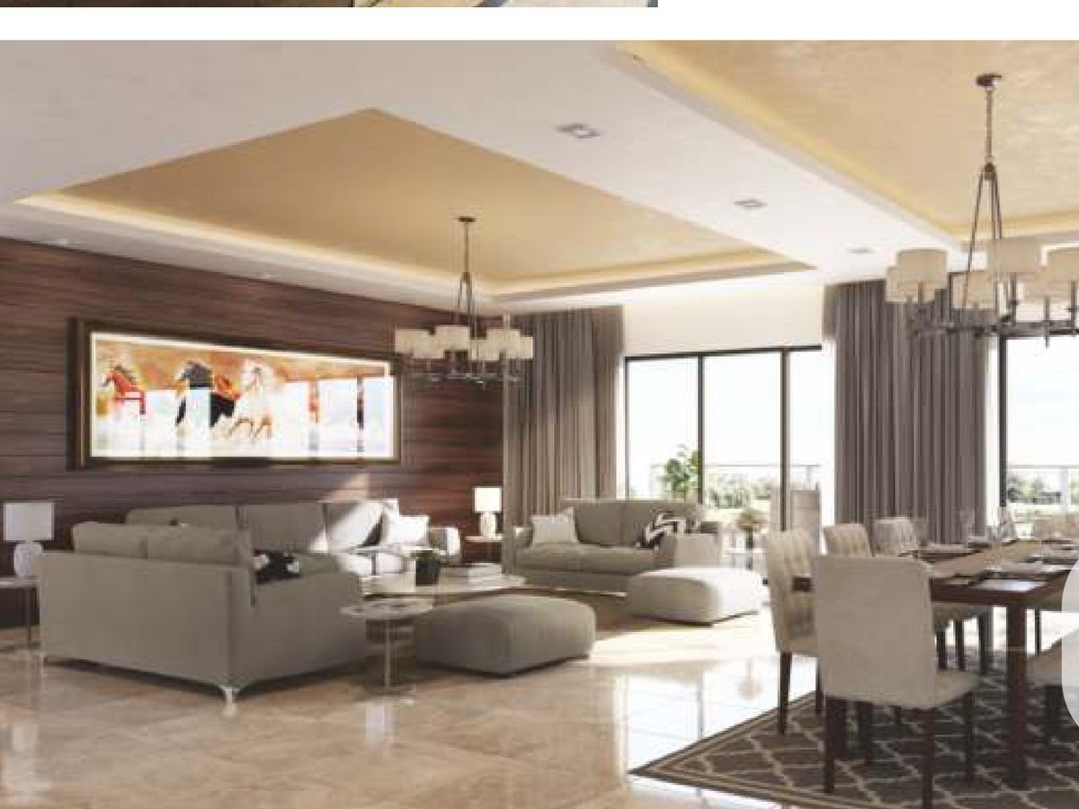 A living and dining room at Rishita Mulberry Heights